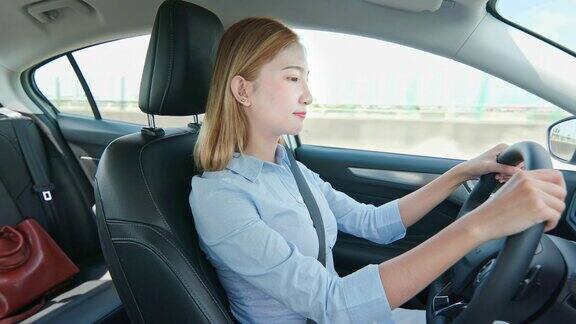 亚洲女商人驾驶汽车
