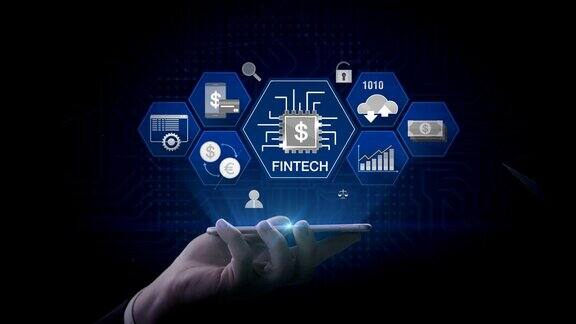 举起智能手机移动金融科技图标和各种图表未来的金融技术4k的电影版本3