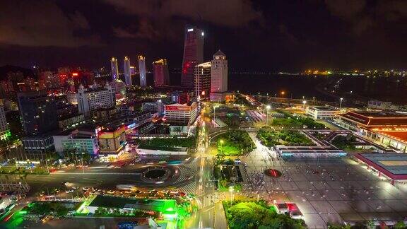 夜晚照亮了珠海城市景观拱北口岸入口拥挤的广场湾屋顶全景4k时间流逝中国