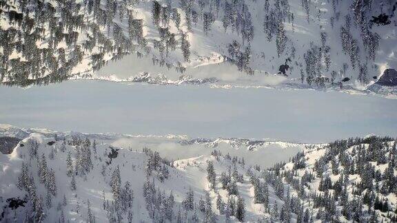 迷幻冬季空中背景镜雪山