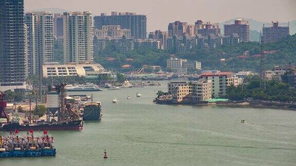 阳光明媚的一天三亚交通港屋顶全景4k时间间隔海南中国