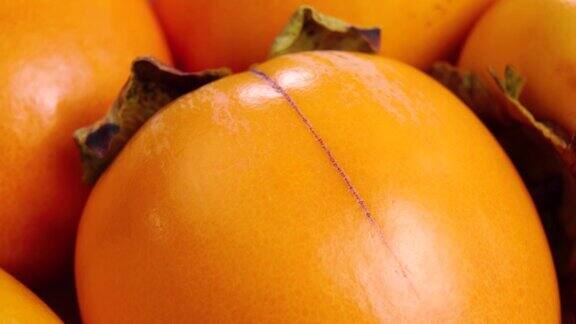 新鲜成熟的柿子水果特写宏