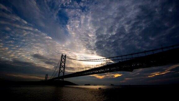 延时4k明石海峡大桥日落天空在神户港日本