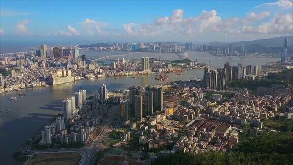 阳光明媚的一天珠海城市景观澳门城市湾航拍全景4k中国