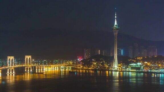 中国夜灯著名的澳门塔桥湾全景4k时间流逝