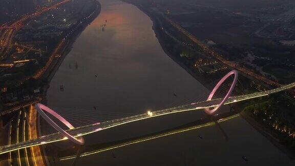 日落夜照明南京城市青年文化中心著名行人滨江眼桥航拍全景4k中国