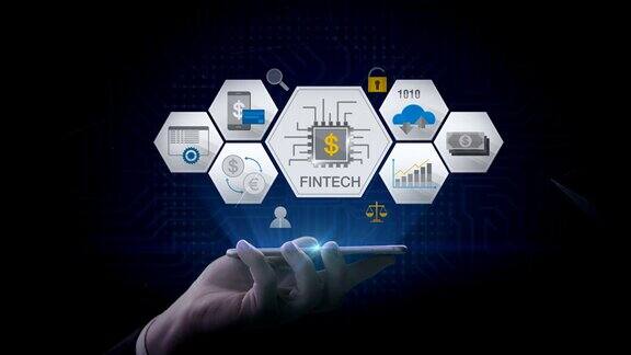 举起智能手机移动金融科技图标和各种图表未来的金融技术4k的电影版本2