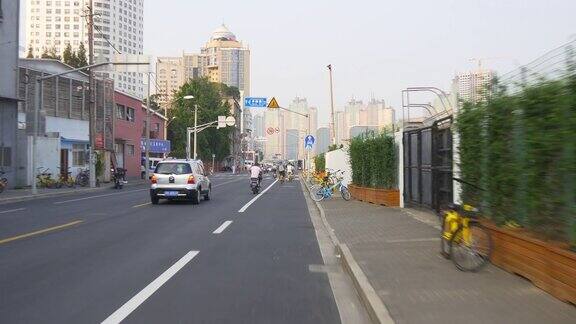 白天时间上海城市公路旅行自行车骑pov湾全景4k中国
