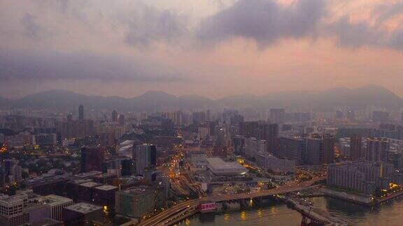 4KHyperlapse:kowloonislandCity的SunriseBuilding-Aerialview香港摩天大楼无人机飞行的发展建筑交通能源电力基础设施亚洲金融和商业中心