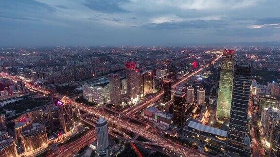 TU鸟瞰图美妙的城市景色白天到夜晚过渡北京中国