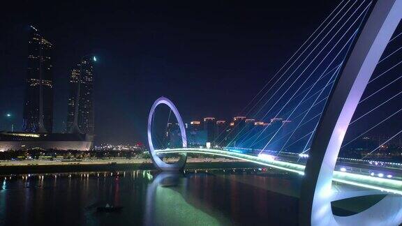 夜景照明南京市青年文化中心著名的人行眼桥江边航拍全景4k中国