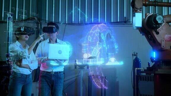 工程师呈现原型机引擎与虚拟现实增强现实技术智能工厂工业4.0自动化机器机器人手臂控制未来的行业理念