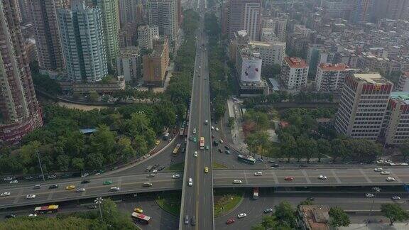 晴天广州市交通街道道路环线十字路口高空俯仰全景4k中国