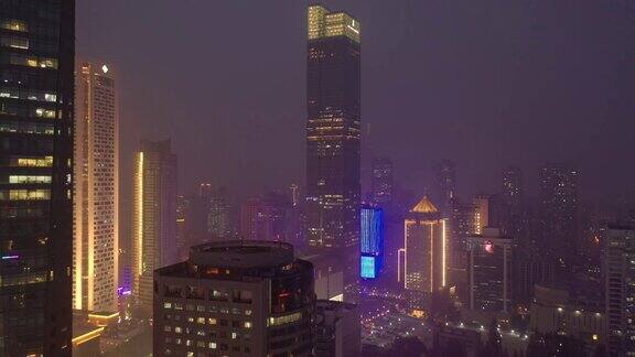黄昏时分夜间照明南京市区办公楼航拍全景4k中国