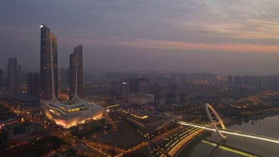 日落夜光南京国际青年文化中心人行滨江大桥航拍全景4k中国