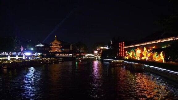 夜间照明南京古城江边游船码头前全景4k中国