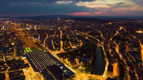 日落天空夜晚照亮苏黎世城市景观交通街道空中全景4k时间流逝瑞士