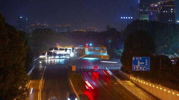 夜景时间照亮杭州市区交通滨江海湾隧道道路延时全景4k中国
