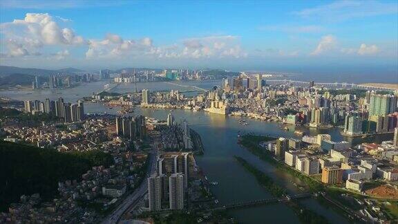阳光明媚的一天珠海城市景观澳门城市湾航拍全景4k中国