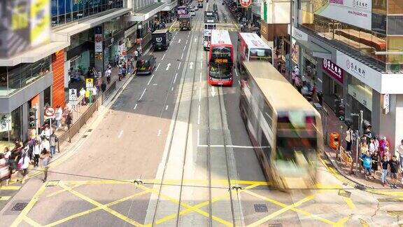 4K时间推移:车辆和行人在香港市中心商业区的交通场景