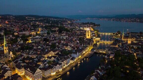 夜间照明苏黎世中心城市景观河岸航拍全景4k时间流逝瑞士