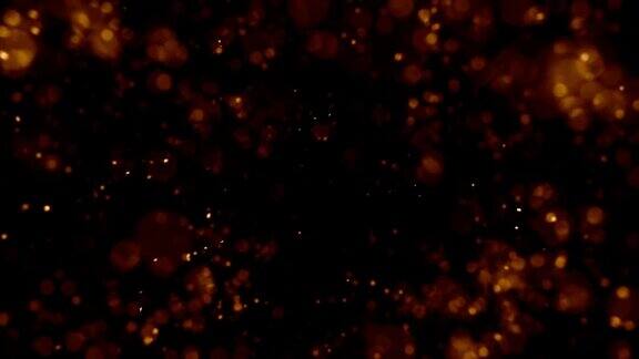 抽象的火焰发光粒子在黑色背景4k3840×2160视频片段