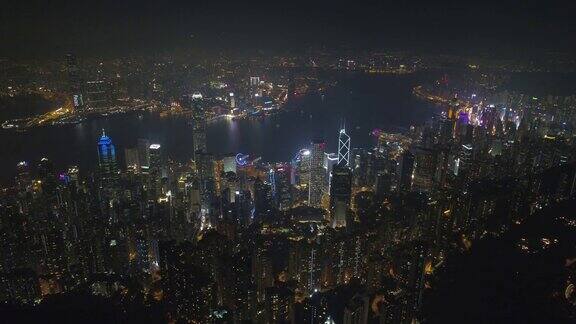 中国夜照亮香港市区海湾航拍全景4k