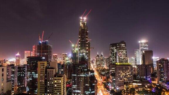 时间流逝照亮北京夜晚的摩天大楼