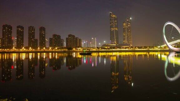 南京夜景照明著名的国际青年文化中心滨江步行桥延时全景4k中国