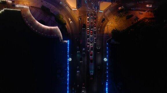 夜光照耀三亚市林春河交通大桥俯视图4k中国海南