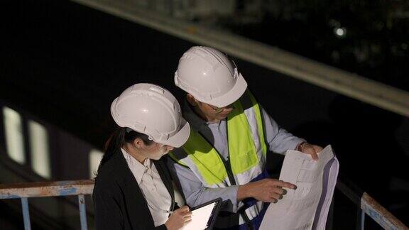 亚洲工程师在晚上工作