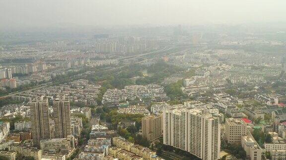 白天飞行在南京城市景观交通街道路口航拍全景4k中国