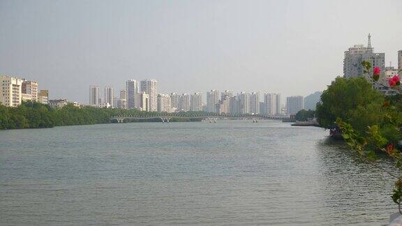 三亚市阳光灿烂的日子江边大桥全景4k海南中国