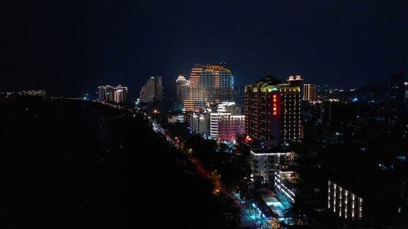 夜间照明海南岛三亚湾航拍全景图4k中国