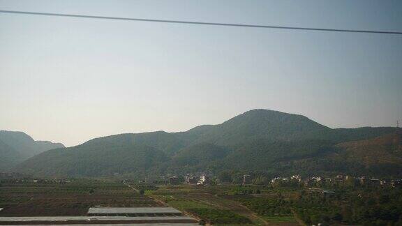 白天时间成都到广州火车公路旅行乘客侧座位窗pov全景4k中国