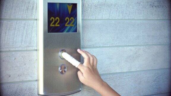 儿童用手指保护电梯的下按按钮