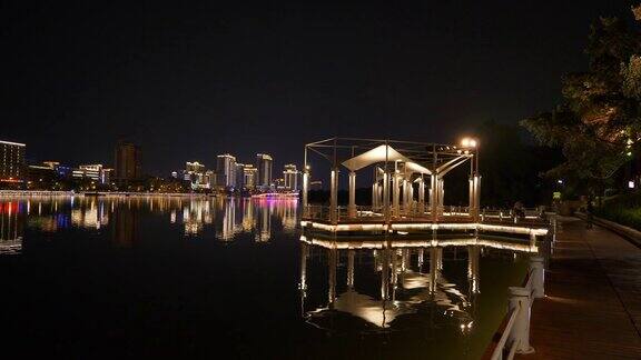 三亚市夜景时间照亮滨江步行湾公园4k海南中国全景