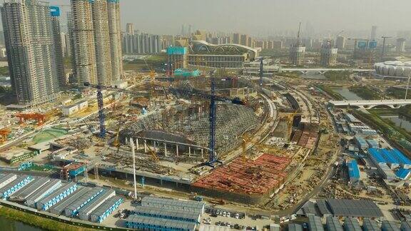 晴朗的一天杭州城巨型建筑场体育场区航拍延时全景4k中国