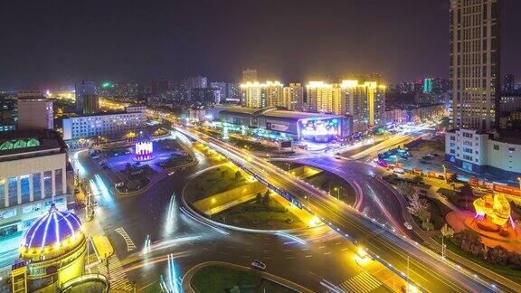 哈尔滨市区的十字路口晚上交通繁忙间隔拍摄4k