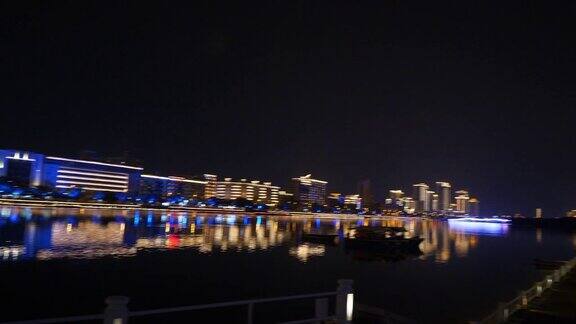 三亚市夜景时间照亮滨江步行湾全景4k海南中国