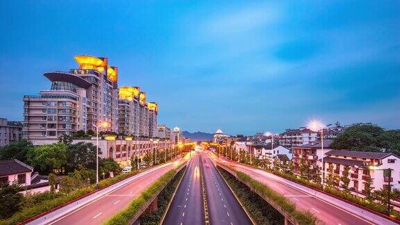 日落时分杭州滨江区与城市景观和交汇处交通繁忙间隔拍摄