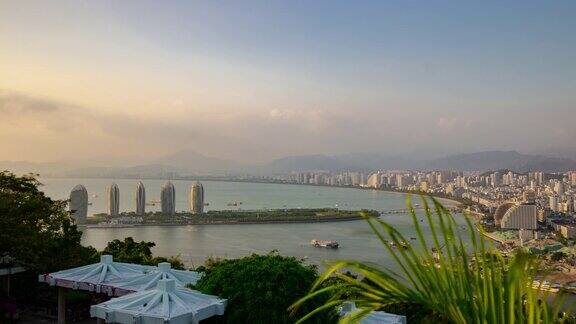 日落照明三亚公园俯视图城市景观全景4k时间推移海南岛中国