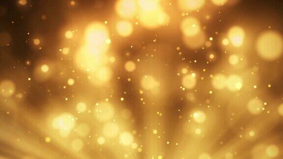 金色颗粒抽象的背景与闪亮的金色浮动尘埃颗粒耀斑散景