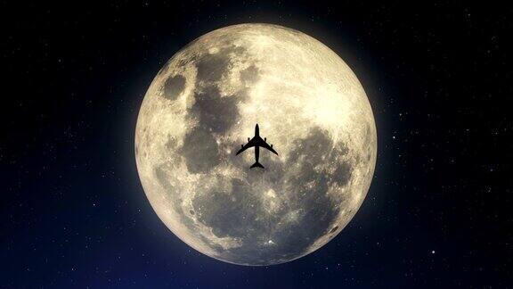 飞机掠过超级月亮的剪影