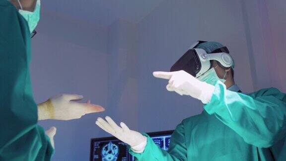 医生正在手术中使用增强现实眼镜学习检查人体内部器官进行手术在现代医院