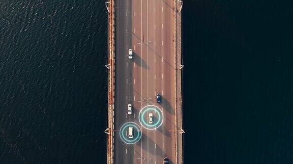 自动驾驶汽车概念汽车在河上城市桥梁上移动的鸟瞰图用传感器扫描道路并控制交通中的车辆未来交通