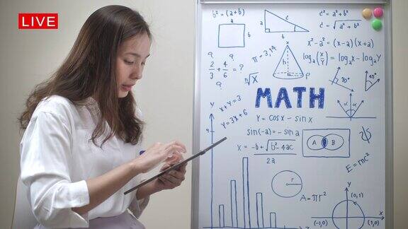 在线教学亚洲女教师数学远程教学在家工作