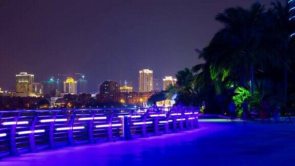 夜晚灯火辉煌的三亚著名酒店综合体湾全景4k时间的中国海南岛