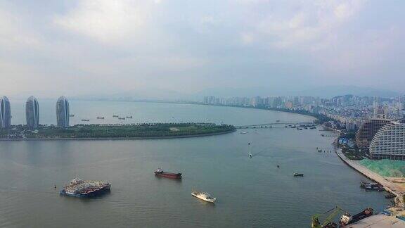 日落时分海南岛三亚湾著名酒店航拍全景4k中国