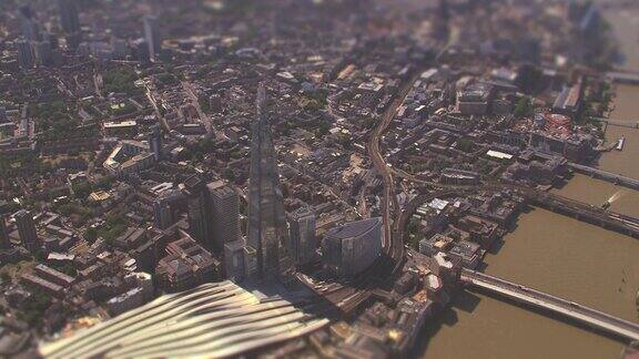鸟瞰碎片大厦泰晤士河和伦敦市中心英国具有倾斜偏移微缩图像效果4k